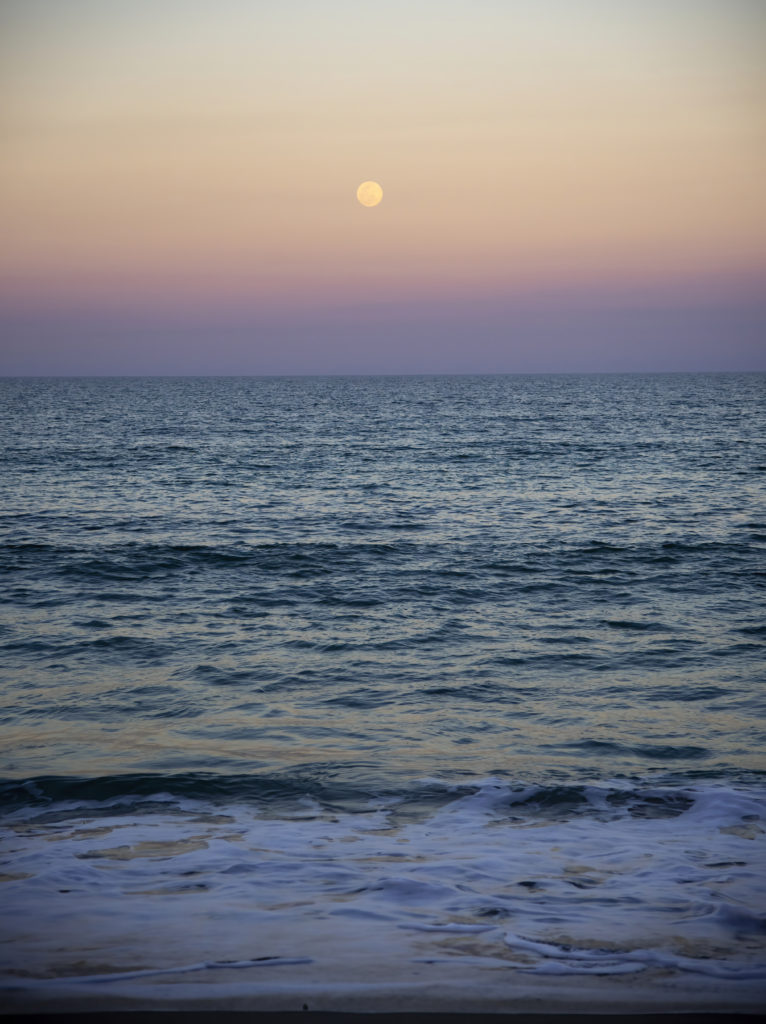 sunset and full moon